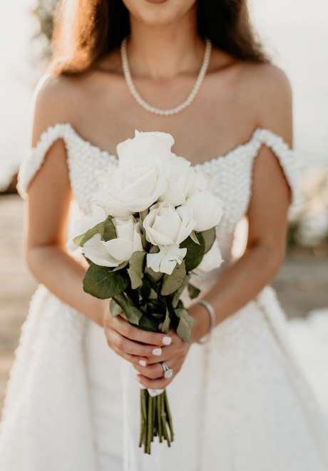 Maysoon Bastoni's white rose wedding bouquet