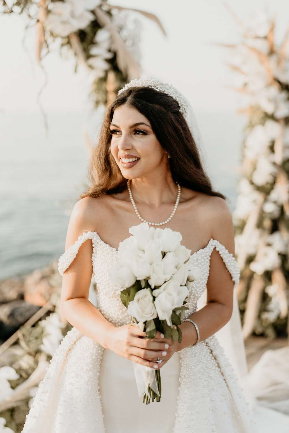 Maysoon Bastoni's white rose wedding bouquet