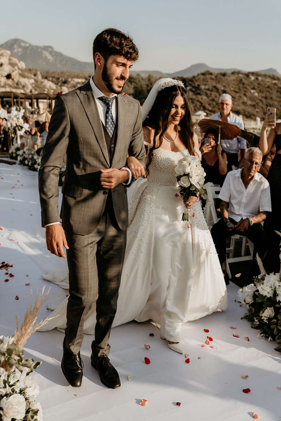 Maysoon Bastoni's brother walking her down the aisle