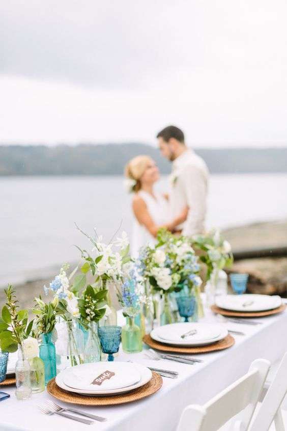 Beach wedding table and tablescape inspiration with coconut, coral